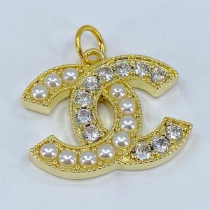 Zipper pull/pendant stamped Chanel